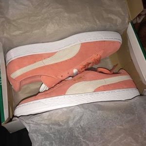 Pink and white puma sneakers